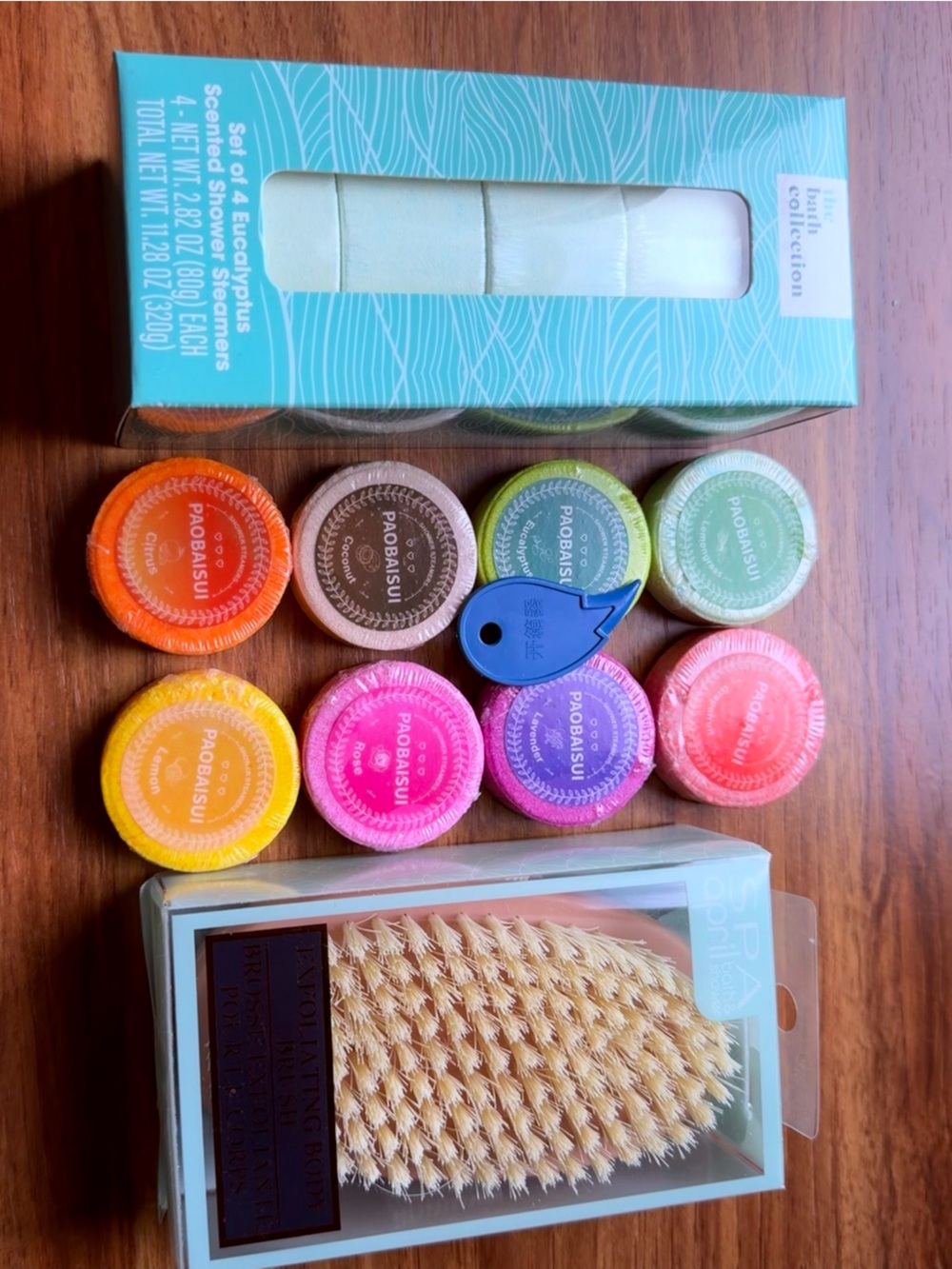 Assorted Color Bath Bomb Set with exfoliating body brush.